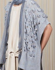 Dahlya Poncho in Silver Melange with batwing sleeves and chic woven hems