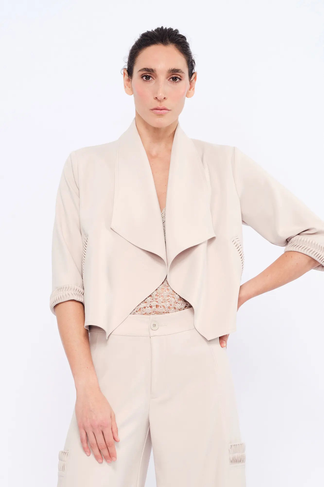 The Daysi Jacket in a natural Ecru, featuring its wide, draped lapel and relaxed silhouette.