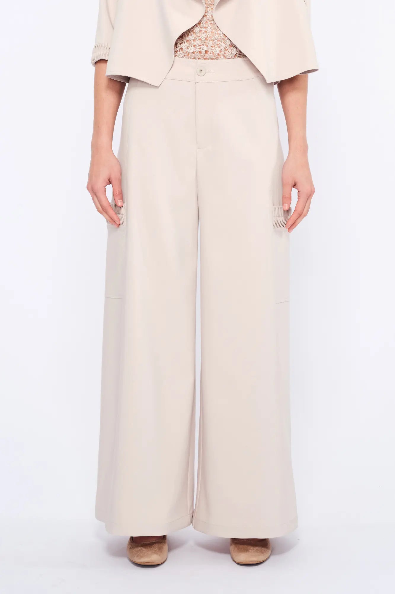 Front view of the Daysi Trouser in Ecru, showcasing its fluid wide-leg silhouette.