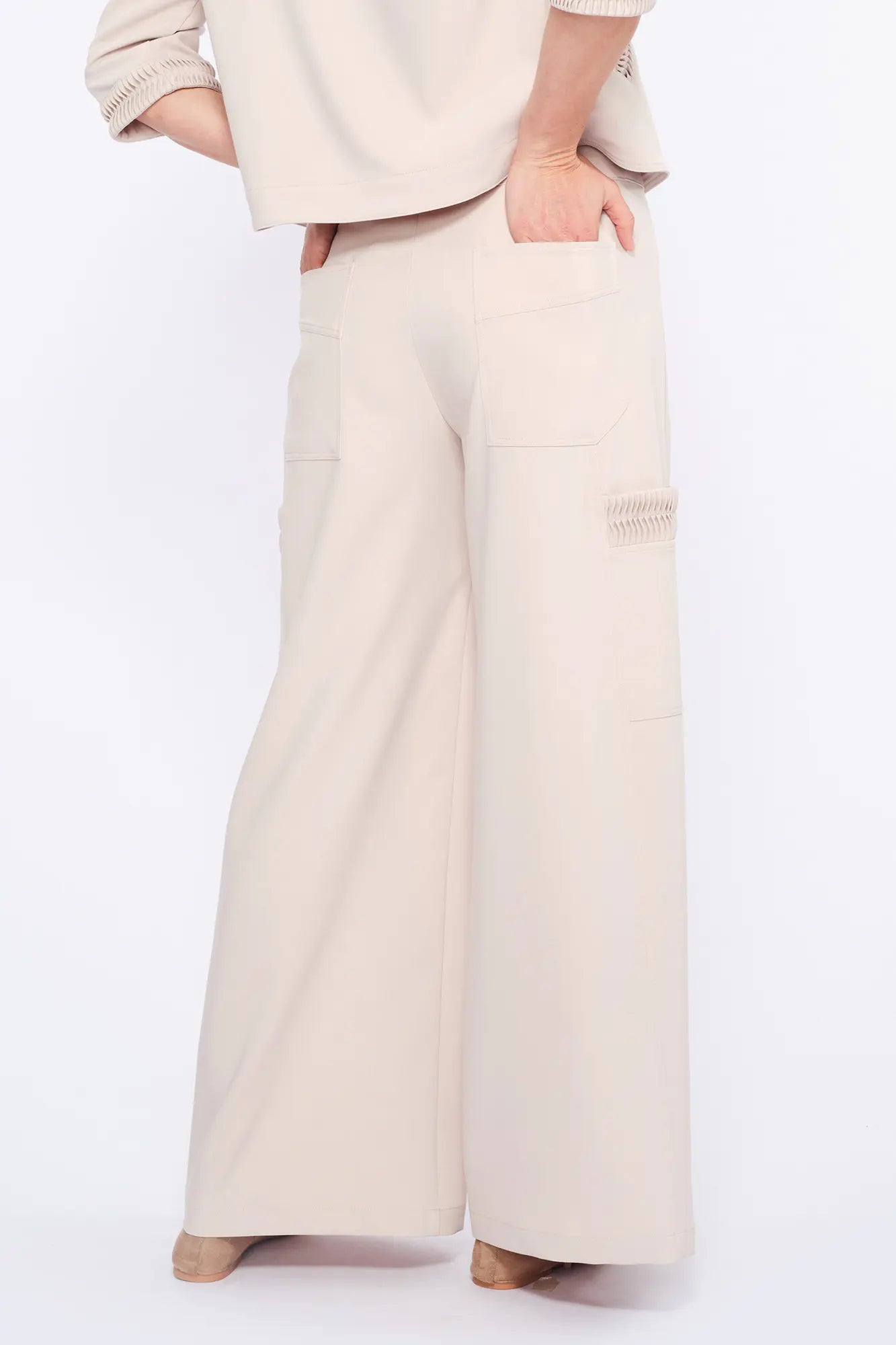 Clean back silhouette of the Daysi Trouser, showing the impeccable fit of the waistband.