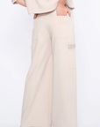 Clean back silhouette of the Daysi Trouser, showing the impeccable fit of the waistband.
