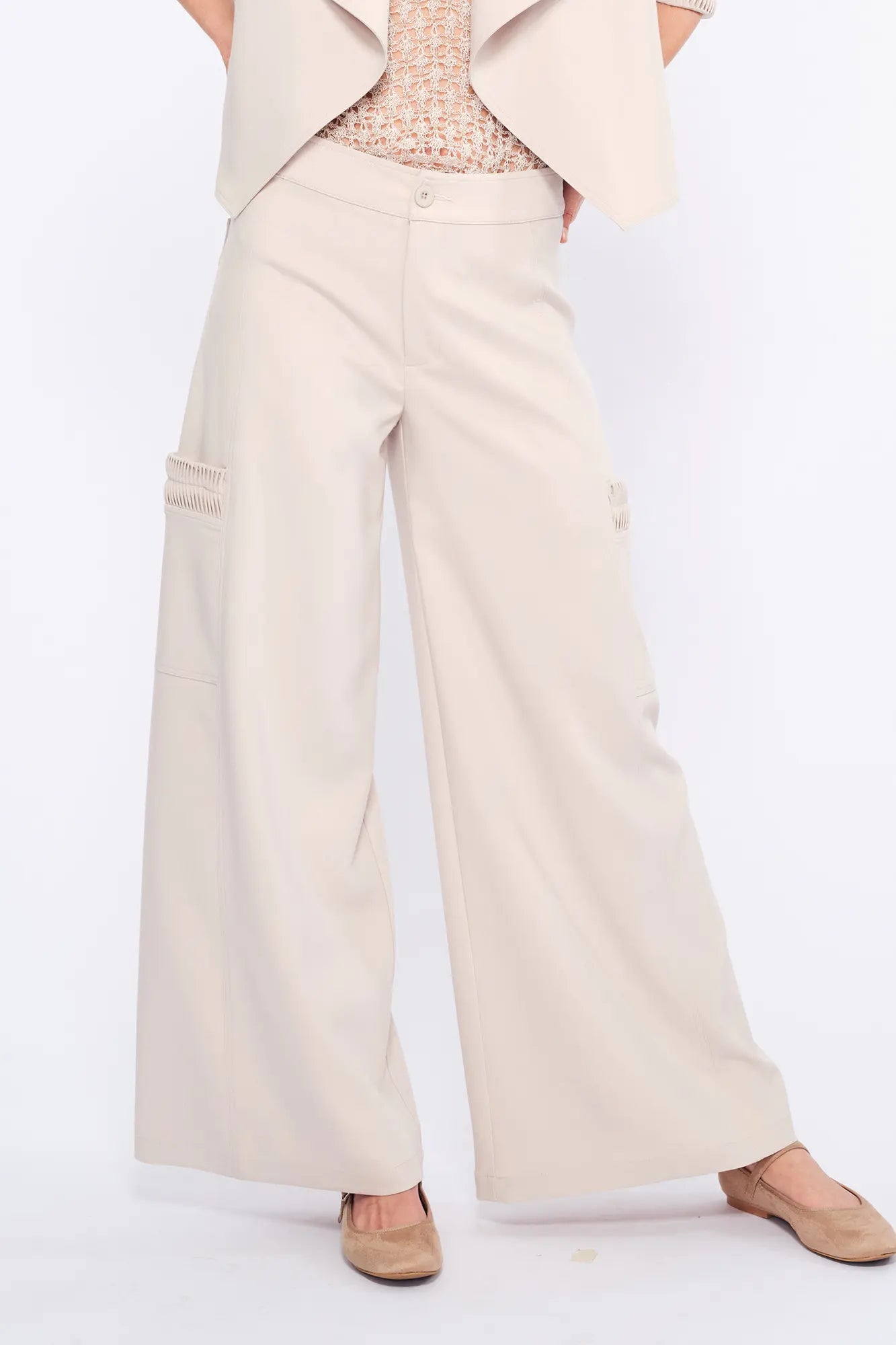 Front view of the Daysi Trouser in Ecru, showcasing its fluid wide-leg silhouette.