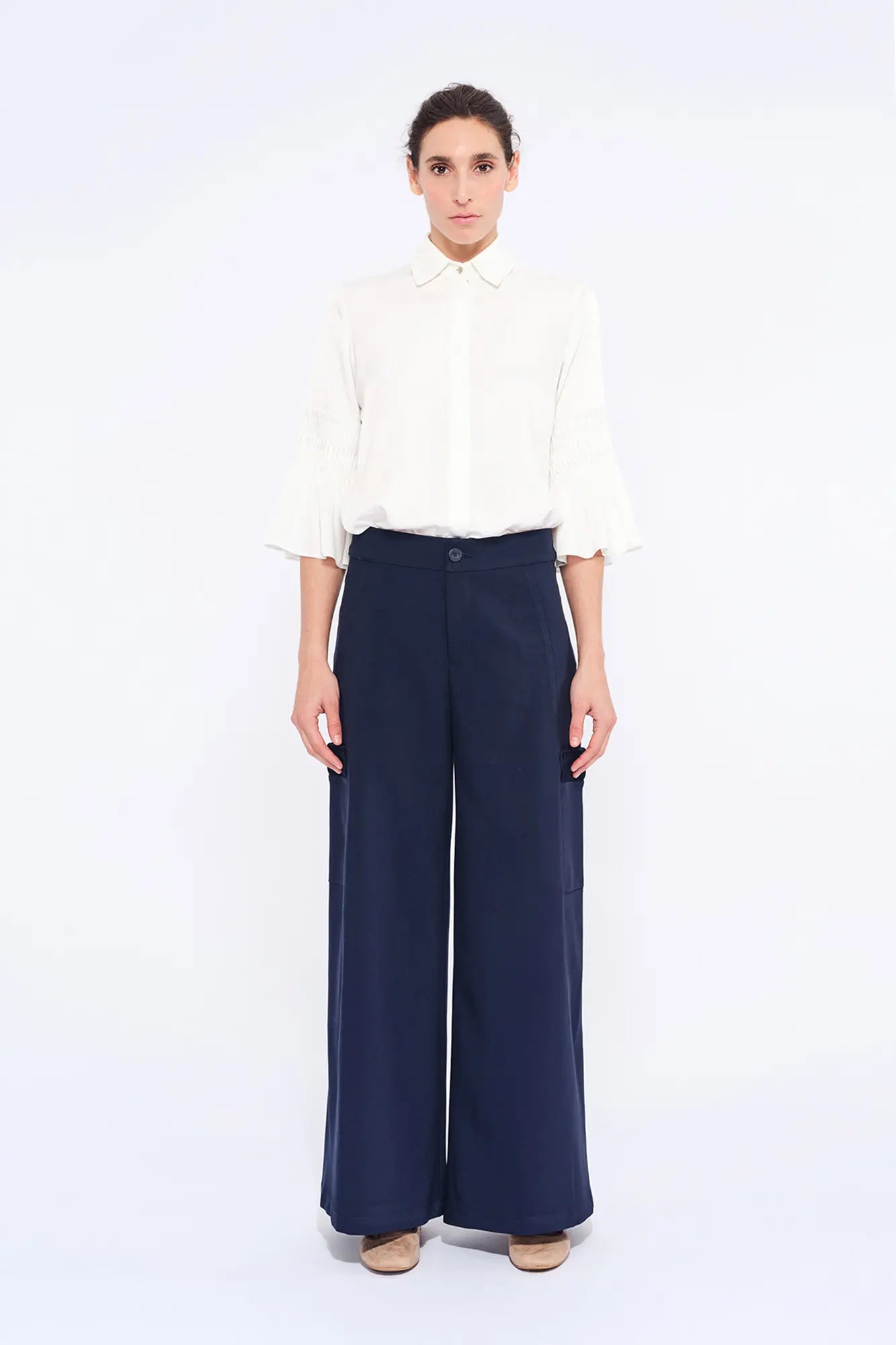 Front view of the Daysi Trouser in Ecru, showcasing its fluid wide-leg silhouette.