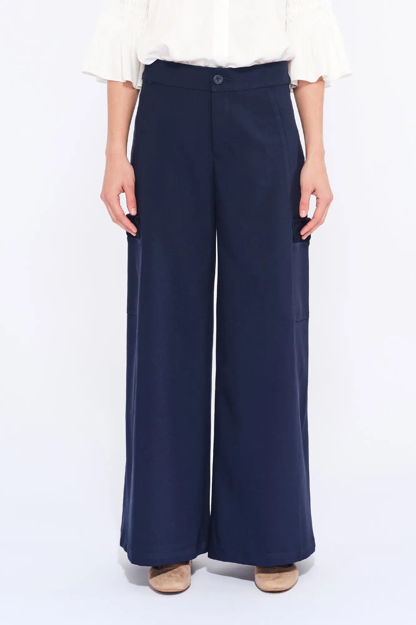 Front view of the Daysi Trouser in Ecru, showcasing its fluid wide-leg silhouette.