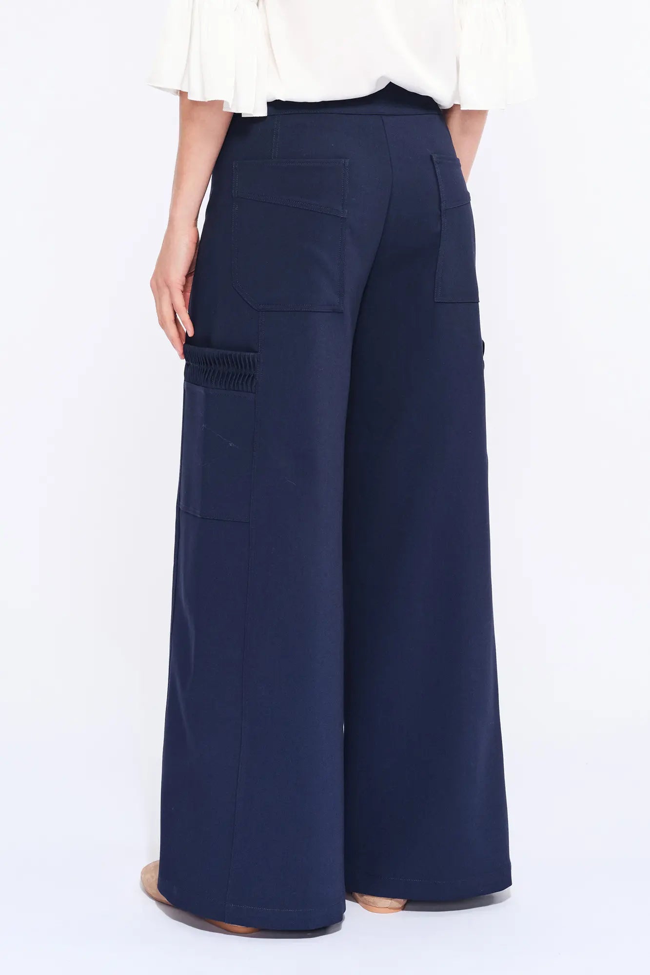 Clean back silhouette of the Daysi Trouser, showing the impeccable fit of the waistband.