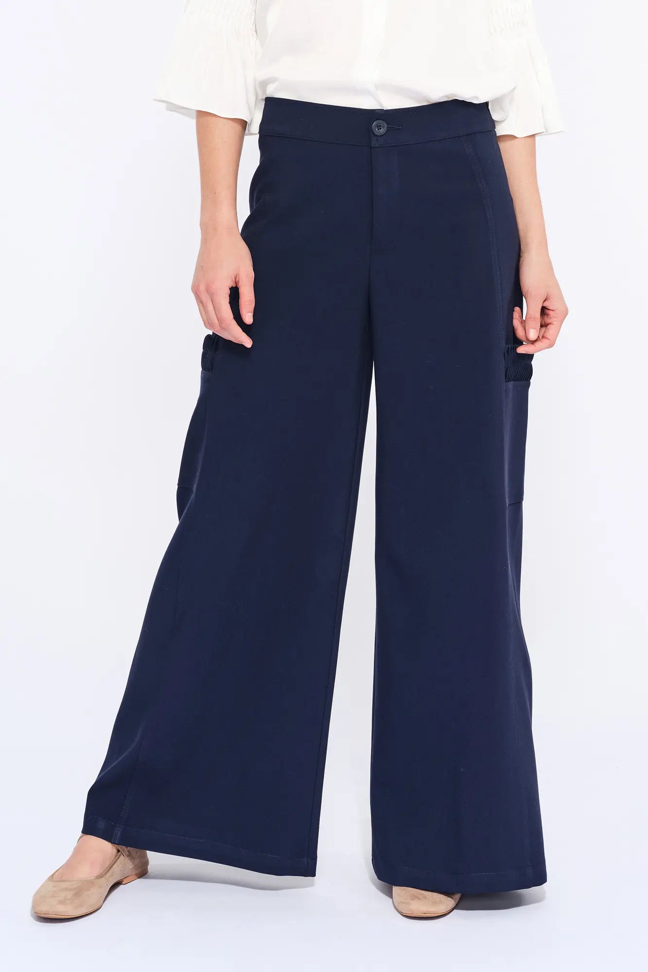 Front view of the Daysi Trouser in Ecru, showcasing its fluid wide-leg silhouette.