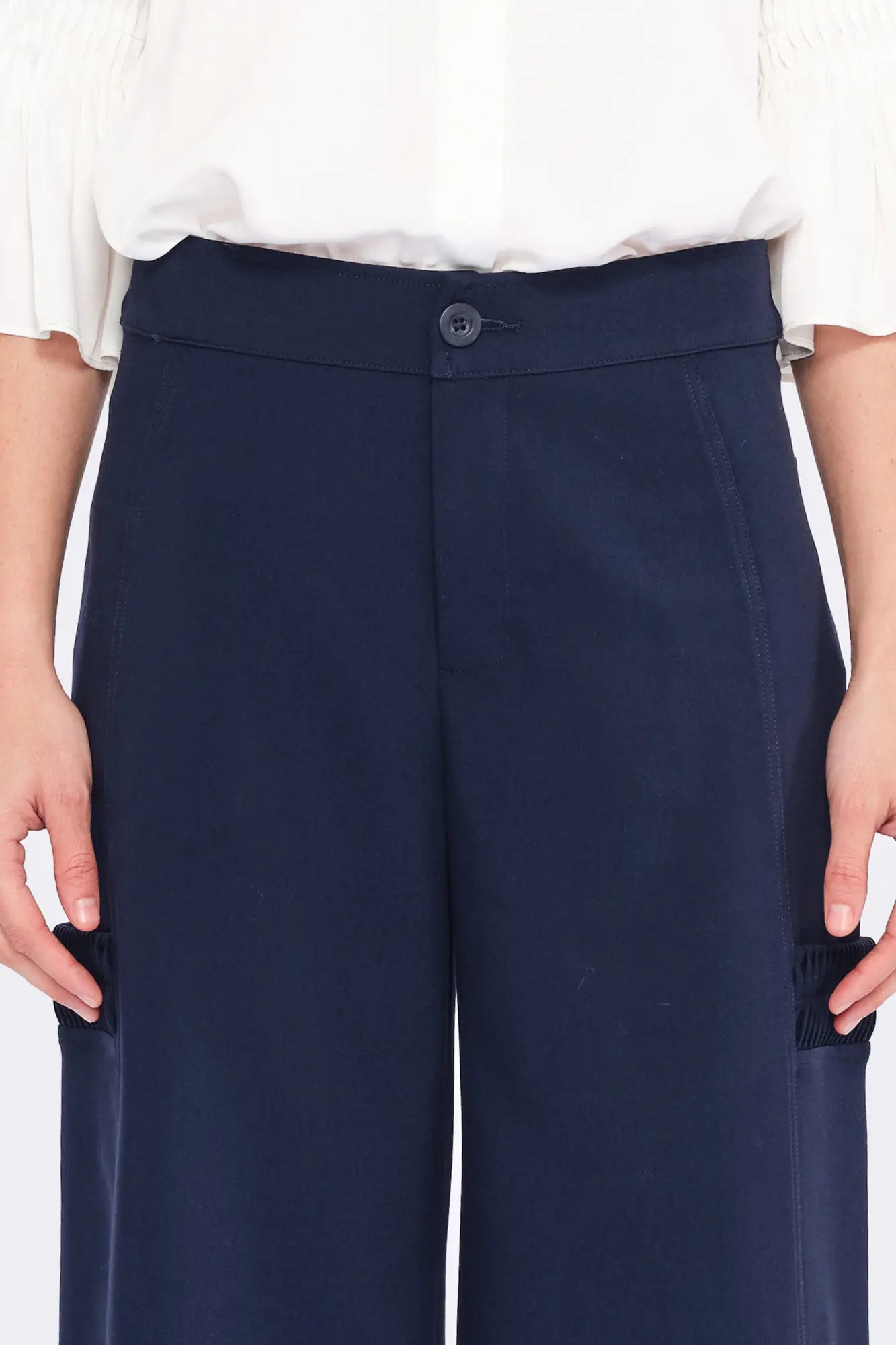 Front view of the Daysi Trouser in Ecru, showcasing its fluid wide-leg silhouette.