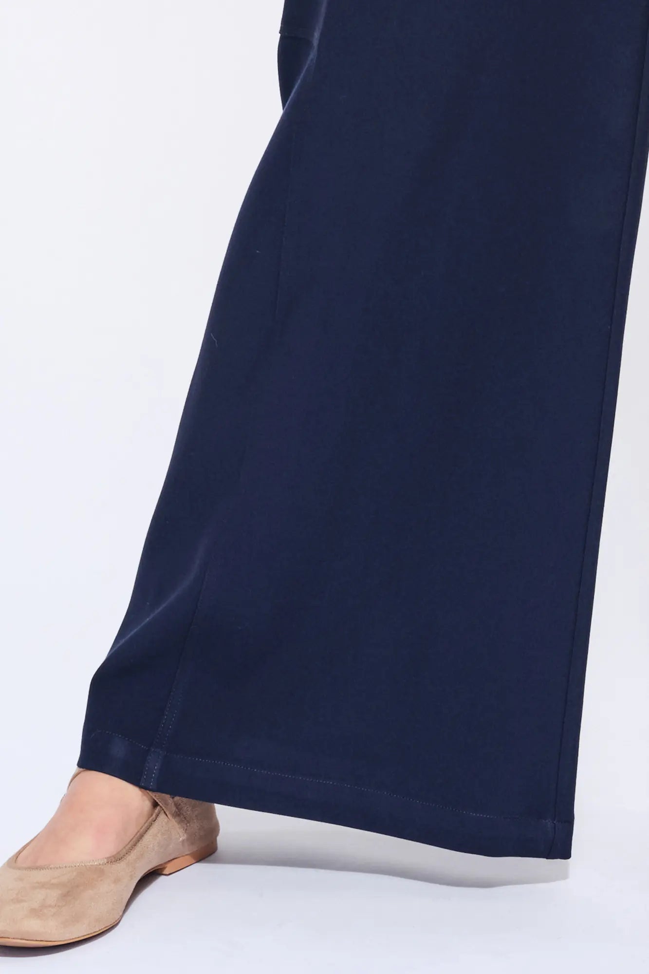 Front view of the Daysi Trouser in Ecru, showcasing its fluid wide-leg silhouette.