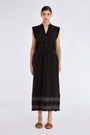 Front view of the Denver Dress in black, showcasing its Nehru collar and artisan-embroidered hem.