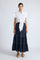Eden Skirt in Navy – Cotton midi skirt with ruffled hem, front patch pockets, and elasticized back waistband.