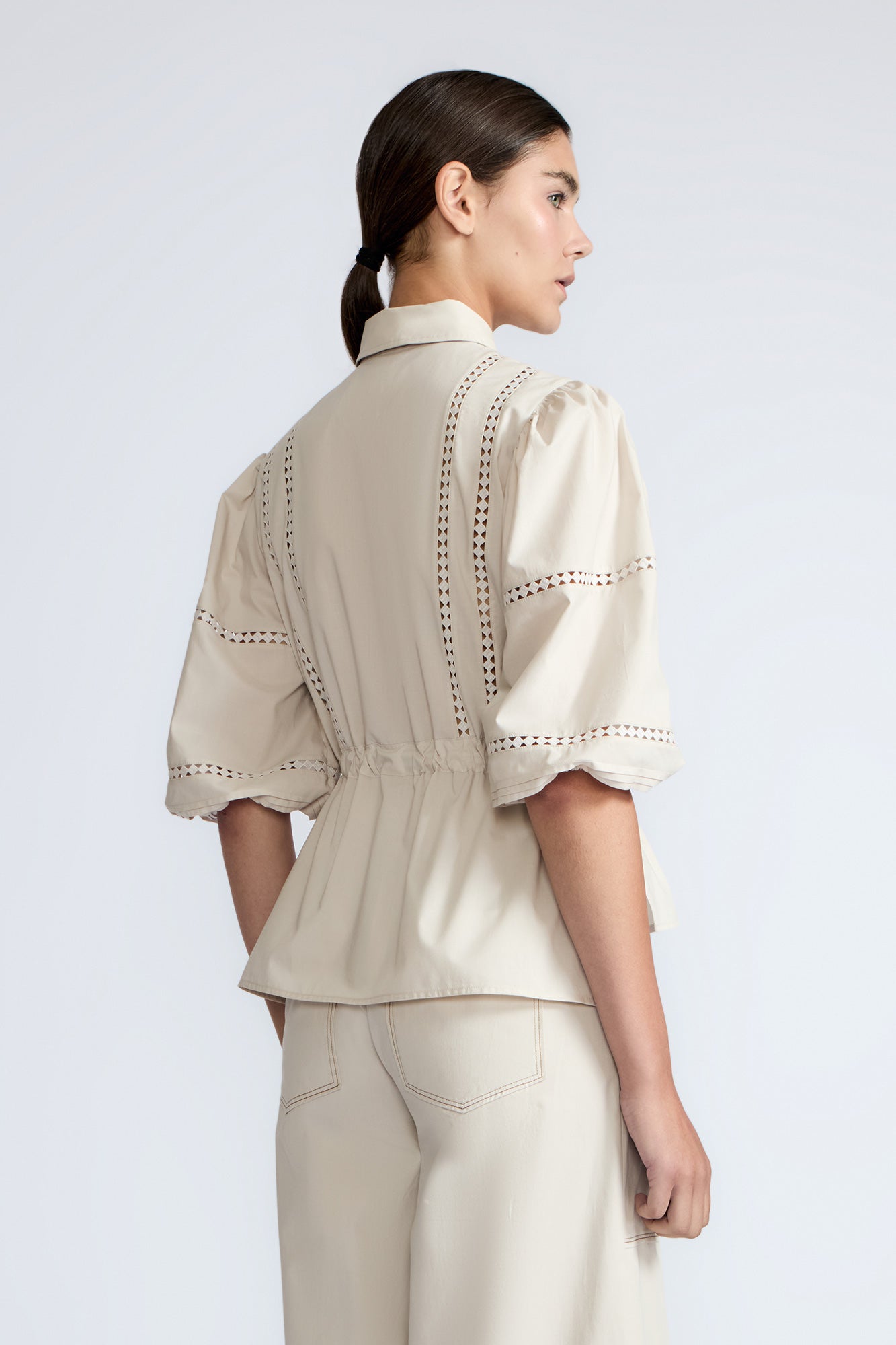 Evangeline Blouse in Prestine – 100% cotton blouse with internal belt, decorative trim, shirt collar, and ¾ sleeves with elastic cuffs.