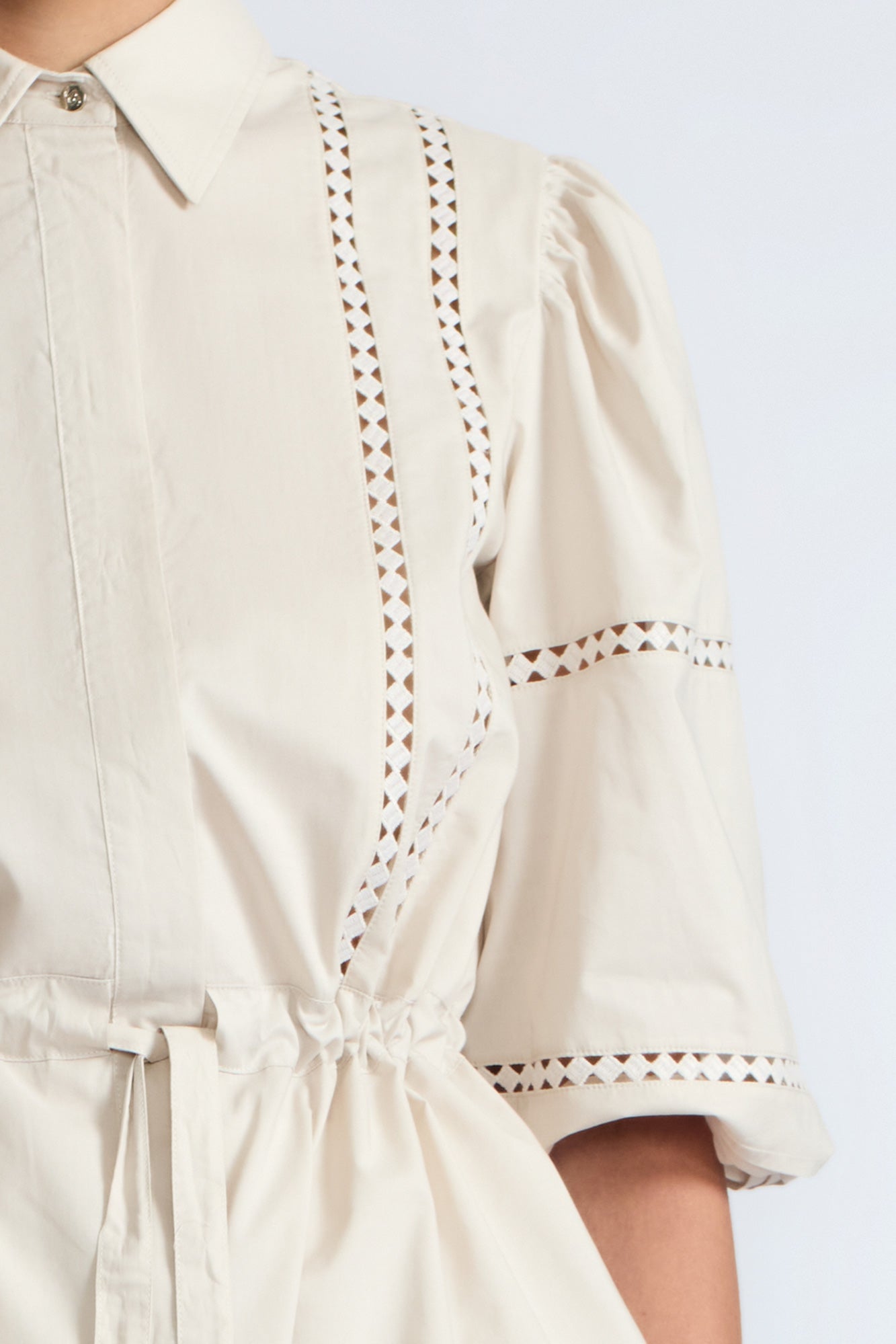 Evangeline Blouse in Prestine – 100% cotton blouse with internal belt, decorative trim, shirt collar, and ¾ sleeves with elastic cuffs.
