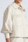 Gwen Jacket in Prestine – Elegant cropped cotton jacket with patch pockets and front pleats for added structure.