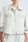 Gwen Jacket in Silver – Cropped cotton jacket with structured pleats, patch pockets, and a modern cut.