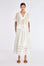 Ivy Blouse in Off White – V-neck short sleeve blouse with tonal hem detail and relaxed silhouette in rayon and nylon blend.