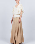 Knitted Alejandra Vest in Ivory Melange with adjustable tie and ruffles