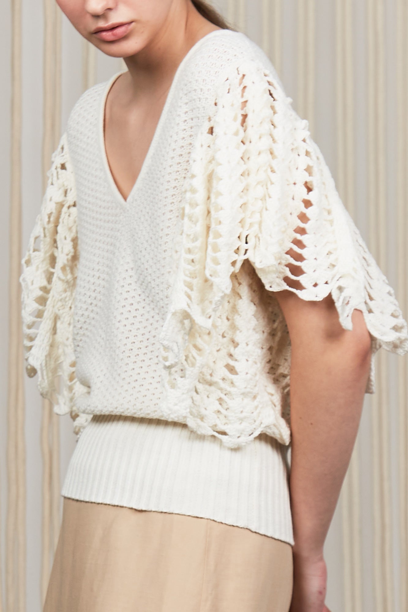 Knitted Alejandra Vest in Ivory Melange with adjustable tie and ruffles