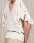 Knitted Alejandra Vest in Ivory Melange with adjustable tie and ruffles