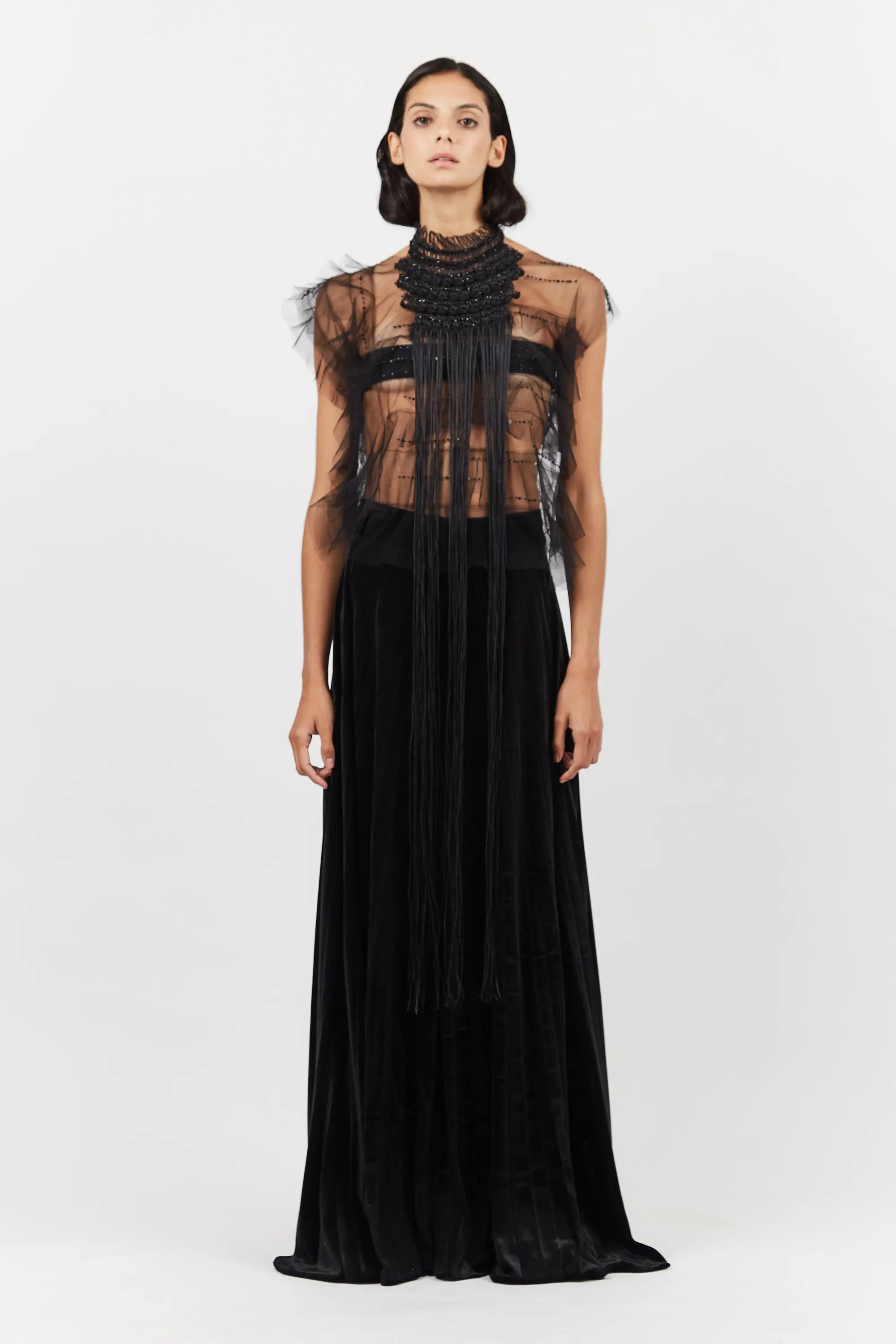 The Lara Artisan Macrame Peto in Black, showcasing the full length and intricate knotwork.