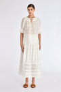 Lauren Blouse in Off White – Round neck blouse with V-slit neckline, adjustable drawstrings, and short elasticized sleeves.
