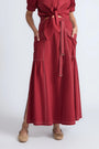 Model wearing the long Milena Maxi Skirt in a rich wine color.