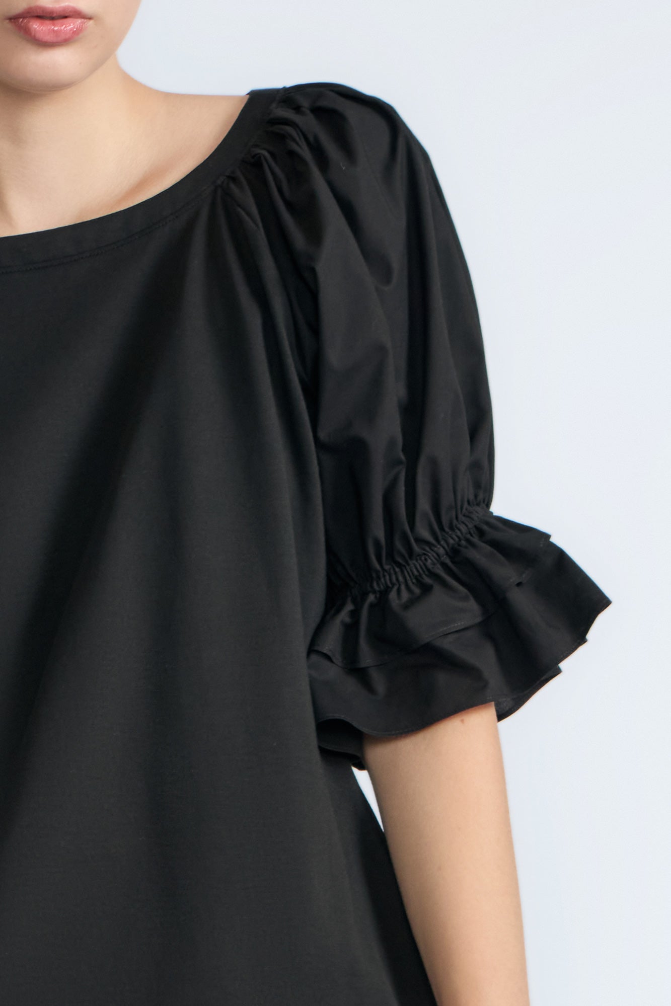 Nery Top in Black – Cotton knit top with short balloon sleeves, round neckline, and soft jersey-pima poplin mix.