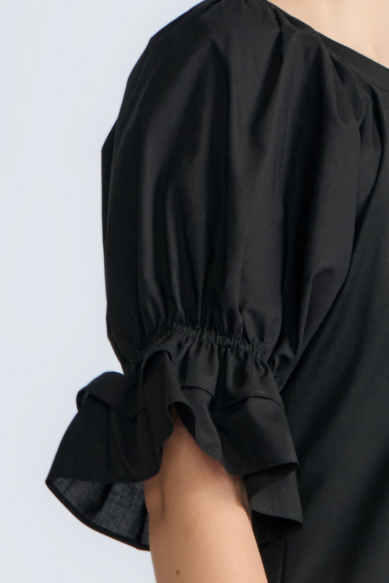 Nery Top in Black – Cotton knit top with short balloon sleeves, round neckline, and soft jersey-pima poplin mix.