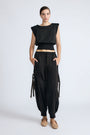 Paloma Pant in Off White – Relaxed cotton pants with patch pockets, contrast stitching, and side ties for a chic silhouette.