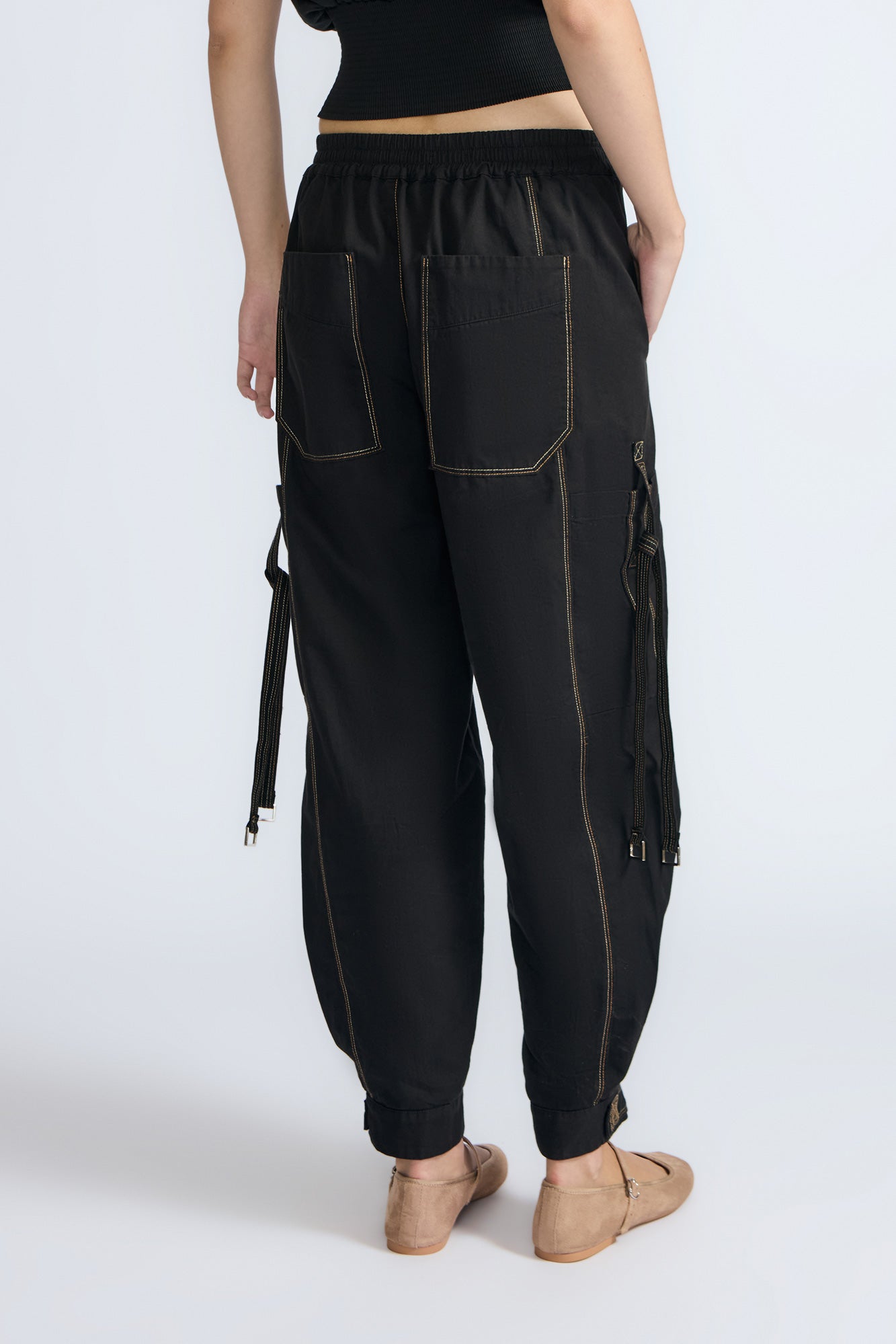 Paloma Pant in Off White – Relaxed cotton pants with patch pockets, contrast stitching, and side ties for a chic silhouette.