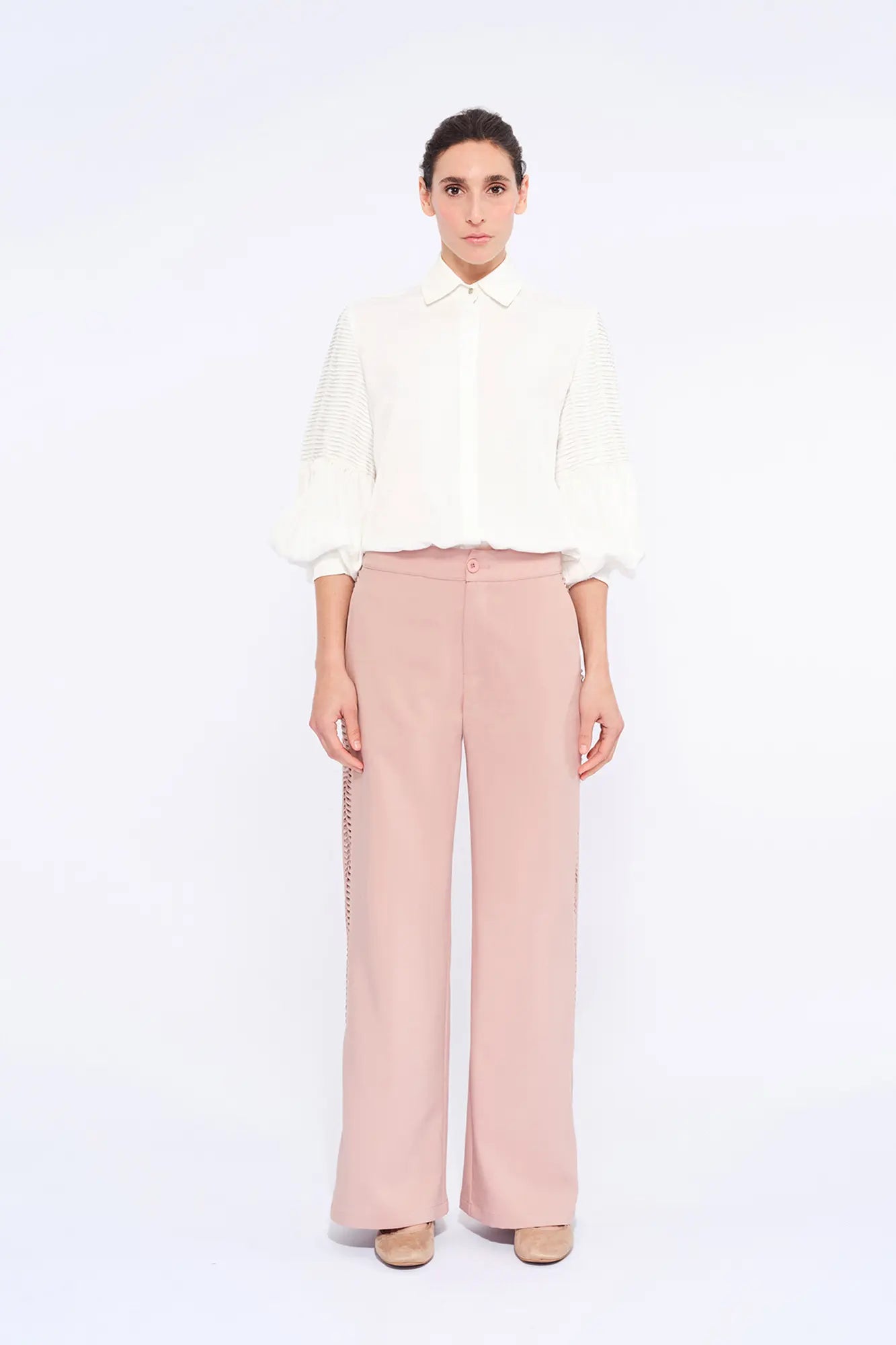 Front view of the Parker Trouser in Rose, showcasing its clean, straight-leg silhouette.