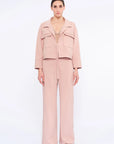 Front view of the Parker Jacket in Rose, showcasing its versatile tie-front design and tailored collar.