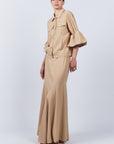 Penny Skirt in Camel with a high-waisted flowing design, ideal for versatile styling and timeless elegance.