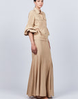 Penny Skirt in Camel with a high-waisted flowing design, ideal for versatile styling and timeless elegance.