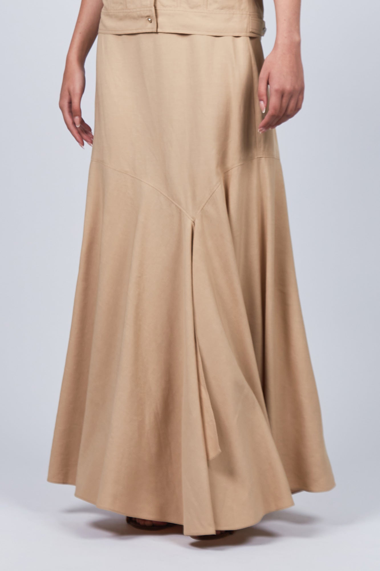 Penny Skirt in Camel with a high-waisted flowing design, ideal for versatile styling and timeless elegance.