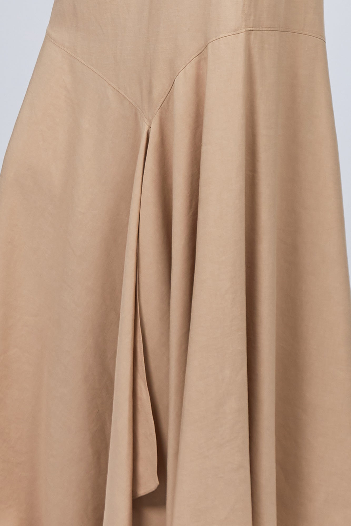 Penny Skirt in Camel with a high-waisted flowing design, ideal for versatile styling and timeless elegance.