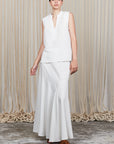 Penny Skirt in Off White with a high-waisted flowing silhouette, offering timeless elegance for any wardrobe.