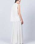 Penny Skirt in Off White with a high-waisted flowing silhouette, offering timeless elegance for any wardrobe.