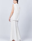 Penny Skirt in Off White with a high-waisted flowing silhouette, offering timeless elegance for any wardrobe.