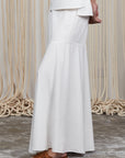 Penny Skirt in Off White with a high-waisted flowing silhouette, offering timeless elegance for any wardrobe.