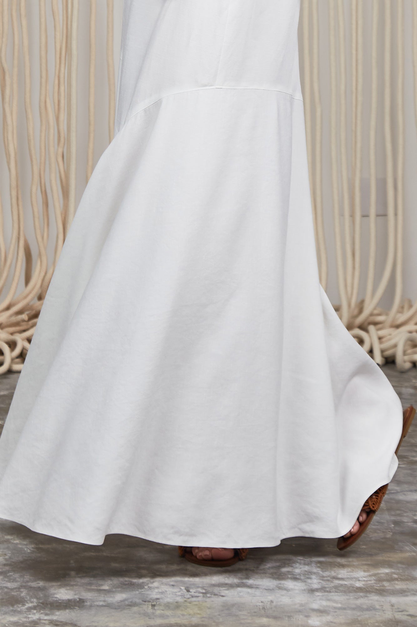 Penny Skirt in Off White with a high-waisted flowing silhouette, offering timeless elegance for any wardrobe.