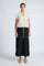 Pria Blouse in Prestine – Elegant sleeveless blouse in pima cotton with tonal V-neck, Greca trim, ruffle detail, and hem with pullers.