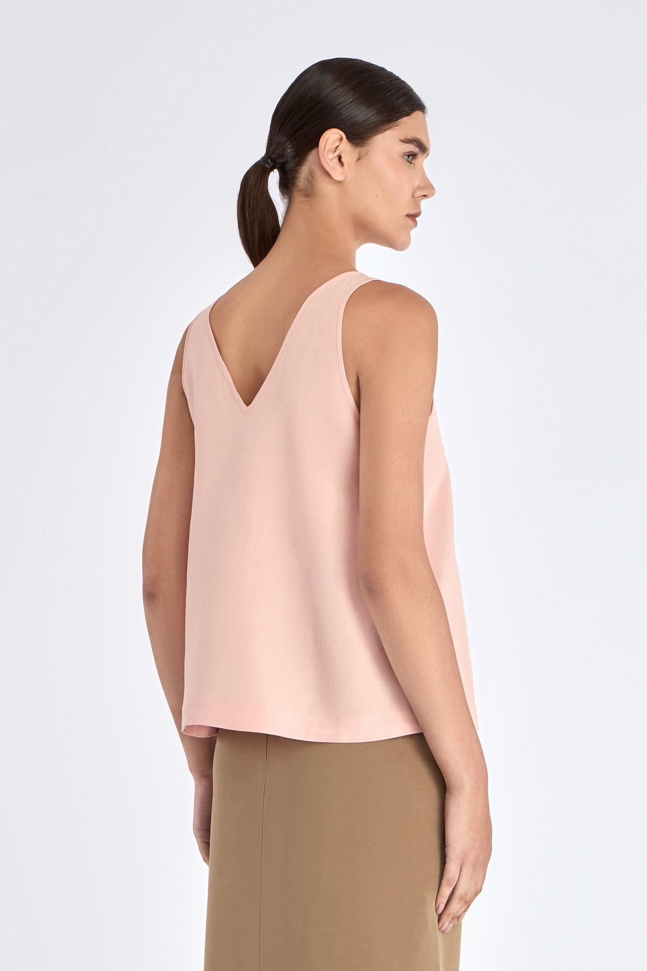 Ryan Top in Rose – Sleeveless top with V-neckline and adjustable drawstring waist with metal stoppers in soft linen blend.
