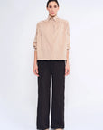 The Star Blouse in a timeless Camel, featuring its crisp shirt collar and the rich tone of its Peruvian cotton.