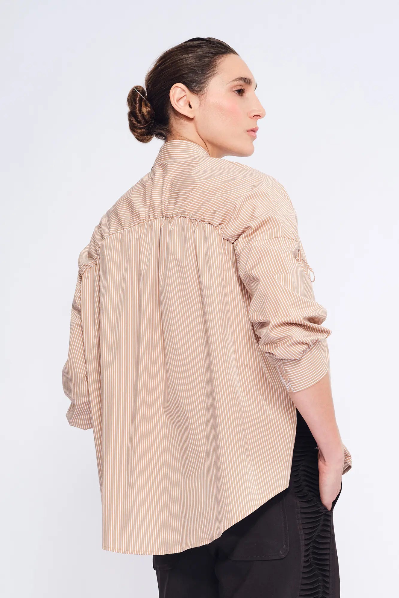 Elegant back view of the Star Blouse in its relaxed, fluid silhouette.