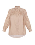 The Star Blouse in a timeless Camel, featuring its crisp shirt collar and the rich tone of its Peruvian cotton.