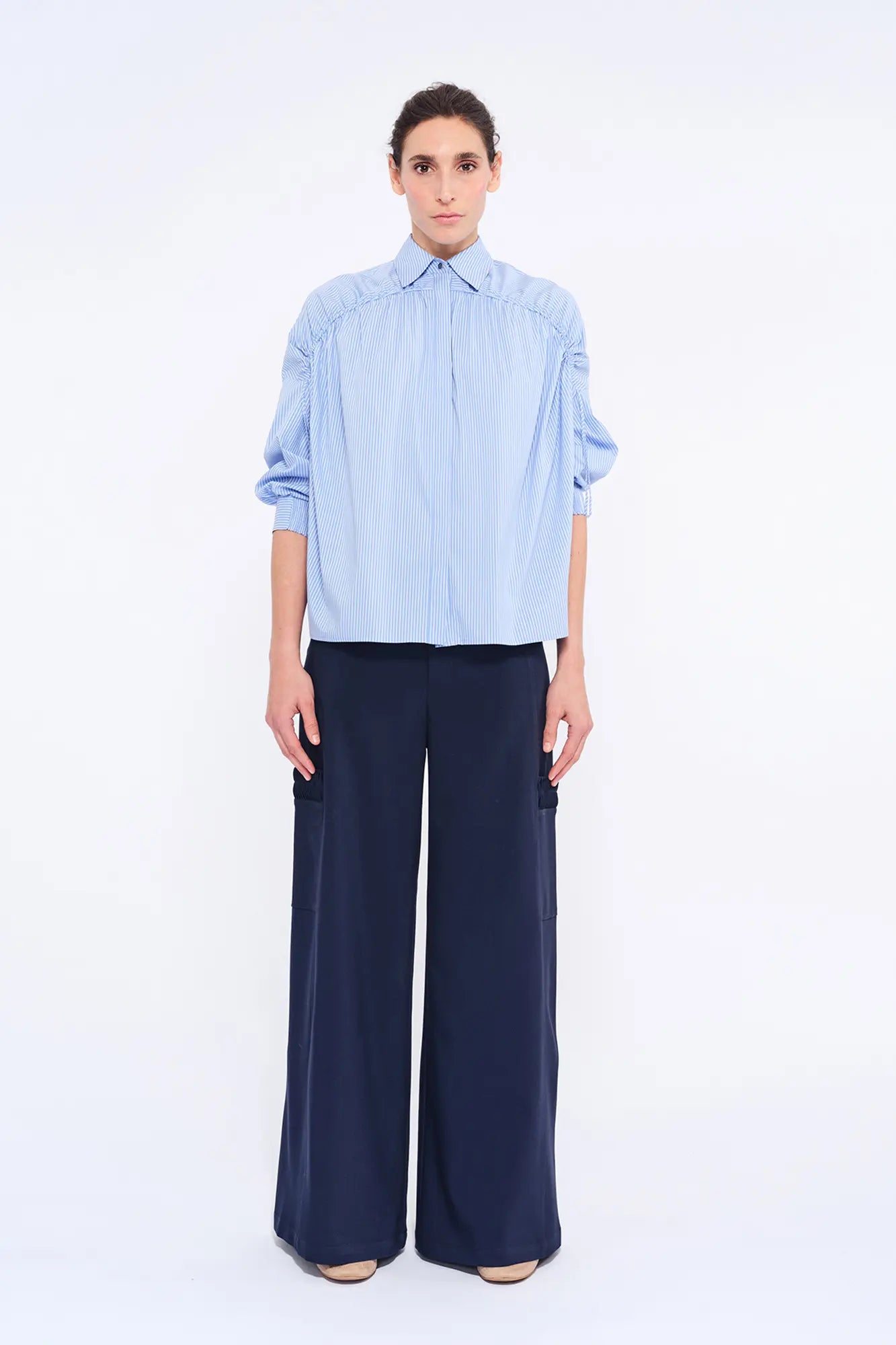 Front view of the Star Blouse in a classic light blue, showcasing its timeless tailoring.