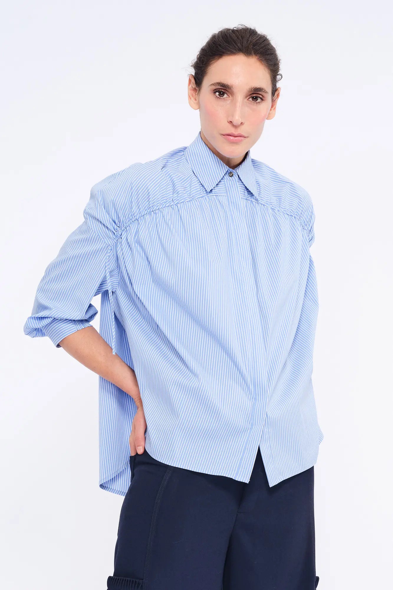 Front view of the Star Blouse in a classic light blue, showcasing its timeless tailoring.