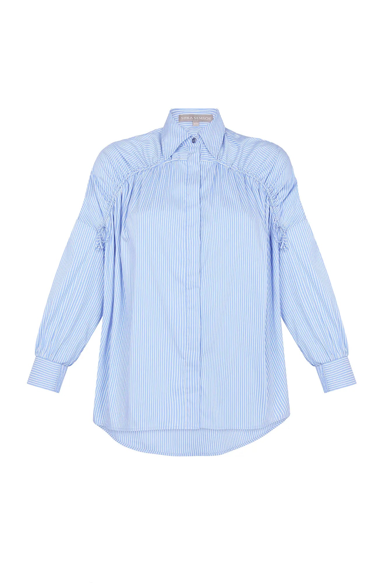 Front view of the Star Blouse in a classic light blue, showcasing its timeless tailoring.