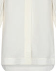 Tatiana Blouse in Off White with a modern shirt collar, hidden button placket, and airy 3/4 puff sleeves.