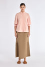 Front view of the Tatiana Blouse in Rose, showcasing its tailored shirt collar and relaxed fit.
